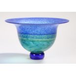 Jane Charles art glass bowl, with mottled blue and green decoration, on a blue glass foot, signed to