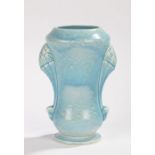 Royal Doulton Art Nouveau style vase, the mottled light blue body with artichoke decorated scroll