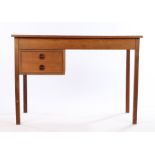 1970's veneered desk, with two frieze drawers, raised on square legs, 105cm wideScratches and