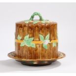 Early 20th Century Majolica cheese dome, the wood effect panel body with leaf and flower design