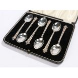 Set of six George V silver teaspoons, London 1933, maker C.E. with shaped finials and interwoven