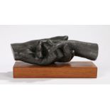 20th Century metal sculpture depicting two clasped hands, initialled SC and numbered 7/30, mounted