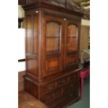 George III style oak display cabinet, with arched glazed and panelled cupboard doors above a base