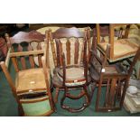 Collection of seven chairs, three with spindle backs, three others upholstered in green, another