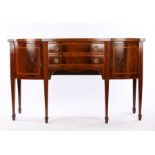 George III mahogany and boxwood strung sideboard, the rectangular top with a bow front above two