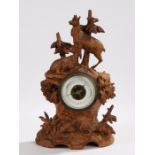 German black forest barometer, the carved case with depiction of two chamois amongst trees, 28cm