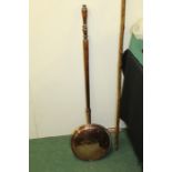 Victorian copper warming pan with turned wooden handle, 106cm long