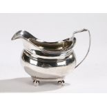 George III silver cream jug, London 1814, makers mark rubbed, with angular handle above the