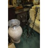 Four iron candle stands, together with a large Greek-style vase (5)