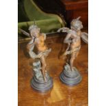 Pair of French bronze effect figures depicting cherubs, 31cm high (2)