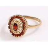 9 carat gold and garnet set ring, ring size P, 2.4g