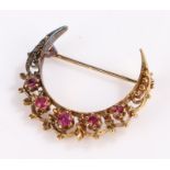9 carat gold brooch, of crescent form set with five graduated pink stones, 4.1g