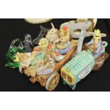 Glass paperweights in the form of a bird and a teapot, Digby pottery model of a tractor and