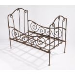 Steel dolls bed, with scrolled side rails and arched head and food board, 51cm x 30cmSurface rust in