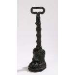 19th Century cast iron doorstop, with pierced finial above a reeded stem and cast clawed foot, 35.