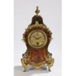 19th Century Boulle mantle clock, the dial with Roman numerals, the case with mask, foliate scroll