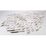 Collection of silver plated flatware, to include a part service, spoons sets, tongs and white