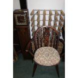 20th Century armchair on turned legs, together with two wicker baskets, a wine rack, and a cased