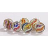 Collection of six 19th Century glass marbles, to include solid core swirls, size range 17mm to