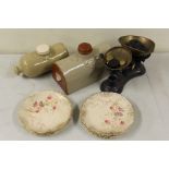Set of scales, with weights, together with two hot water bottles and plates, (qty)