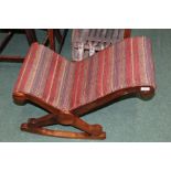 Mahogany gout stool with striped upholstery