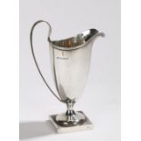 George V helmet shaped silver cream jug, Birmingham 1915, maker T H Hazlewood & Co, with reeded loop