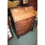 Mahogany bureau, the fall opening to reveal an arrangement of pigeonholes and drawers above four