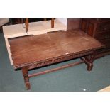 Oak coffee table, with lunette carved frieze, raised on turned legs and chamfered stretchers,