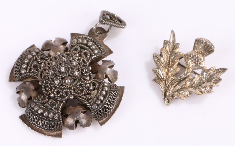 Jerusalem silver cross form pendant, silver thistle form brooch, 19.1g (2)