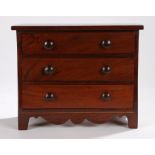 George III mahogany miniature chest of three long drawers, the drawers with turned wooden handles