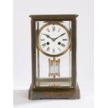 Victorian four glass clock, the brass case with bevelled panels, the enamel dial with Roman numerals