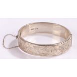Silver bracelet, with scroll decoration and security chain, 22.8g