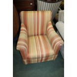 Armchair upholstered in a striped material, on turned legs