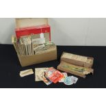 Two Great Britain stamp albums, loose stamps, cigarette card albums and loose cigarette cards sorted