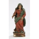 18th Century polychrome decorated carving depicting a female saint, 44cm highRight arm broken at