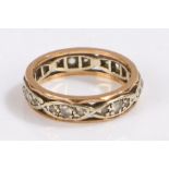Gold coloured metal eternity ring, set with clear paste, ring size K, 3.1g