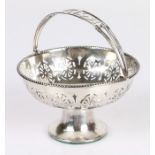 George V silver pierced pedestal basket, Birmingham 1923, maker Marson & Jones, with pierced swing