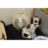 Royal Doulton 'Thermette' bedwarmer, 24cm high, together with a Staffordshire ware dog, 24cm high (