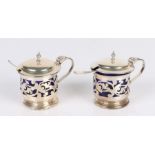 Pair of Edward VII silver mustard pots and covers, Birmingham 1904, maker William Hutton & Sons Ltd,