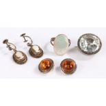 Pair of silver and amber earrings, pair of cameo earrings, silver and mother of pearl set ring,