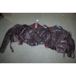 Three black leather jackets (3)