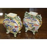 Pair of Japanese vases with figural and scroll decoration, 11cm high