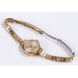 Tallis 9 carat gold ladies wristwatch, the signed silver dial with baton markers, manual wound, on a
