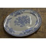 Late 19th Century blue and white decorated meat platter, with floral decorations, marked to the