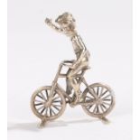 Continental silver depiction of a young boy on a bicycle with his hands raised, Chester import marks
