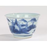 Chinese Qing Dynasty porcelain cup, Kangxi period, decorated in blue with figures and pagodas