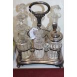 Silver plated six bottle cruet frame