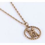 9 carat gold pendant depicting two putti, on a 9 carat necklace, 5.9g