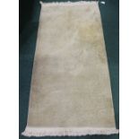 Cream coloured runner, decorated with scrolling leaves and flowers, with tasselled ends, 150cm x