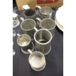 Seven pewter pint and half pint tankards (7)